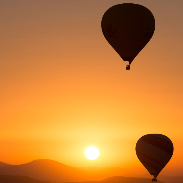 LiNGER Sabbaticals and Bespoke Holidays - Inspire me - Hot Air Balloons At Sunset