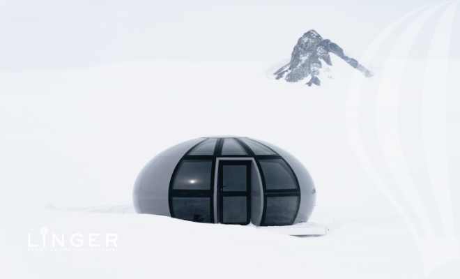 Luxury pod in Antarctica in snow with peak behind - White Desert camp - LiNGER Travel
